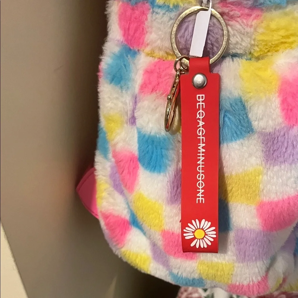 Claire's Fuzzy Multicolor Checkered Backpack - Picture 2 of 6